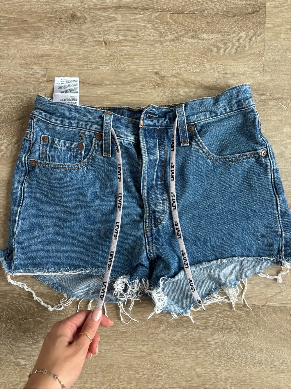 Levi's Medium Blue Distressed Denim Cutoff Shorts